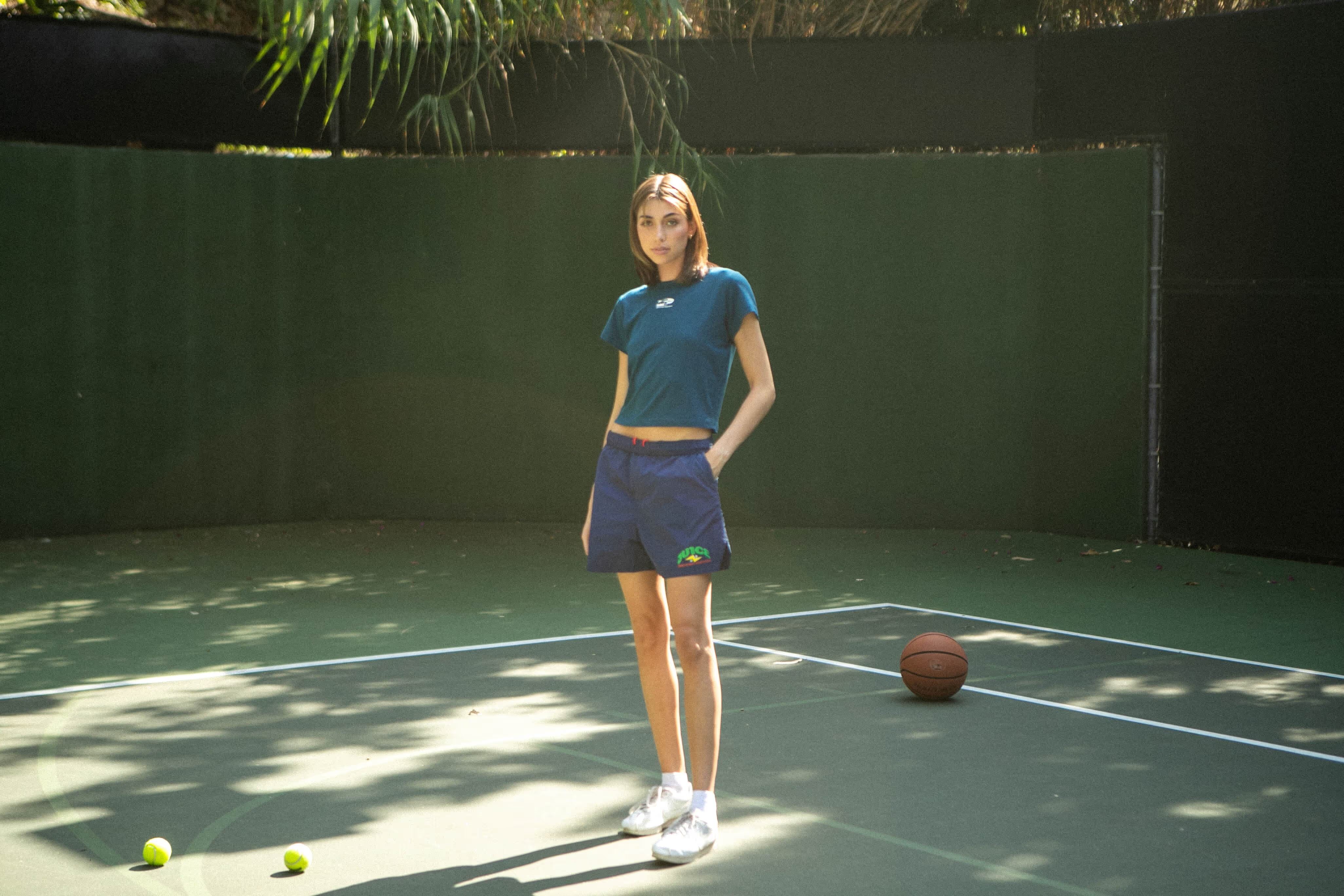Athlete on a multi-sport court in Driveway Paradise gear