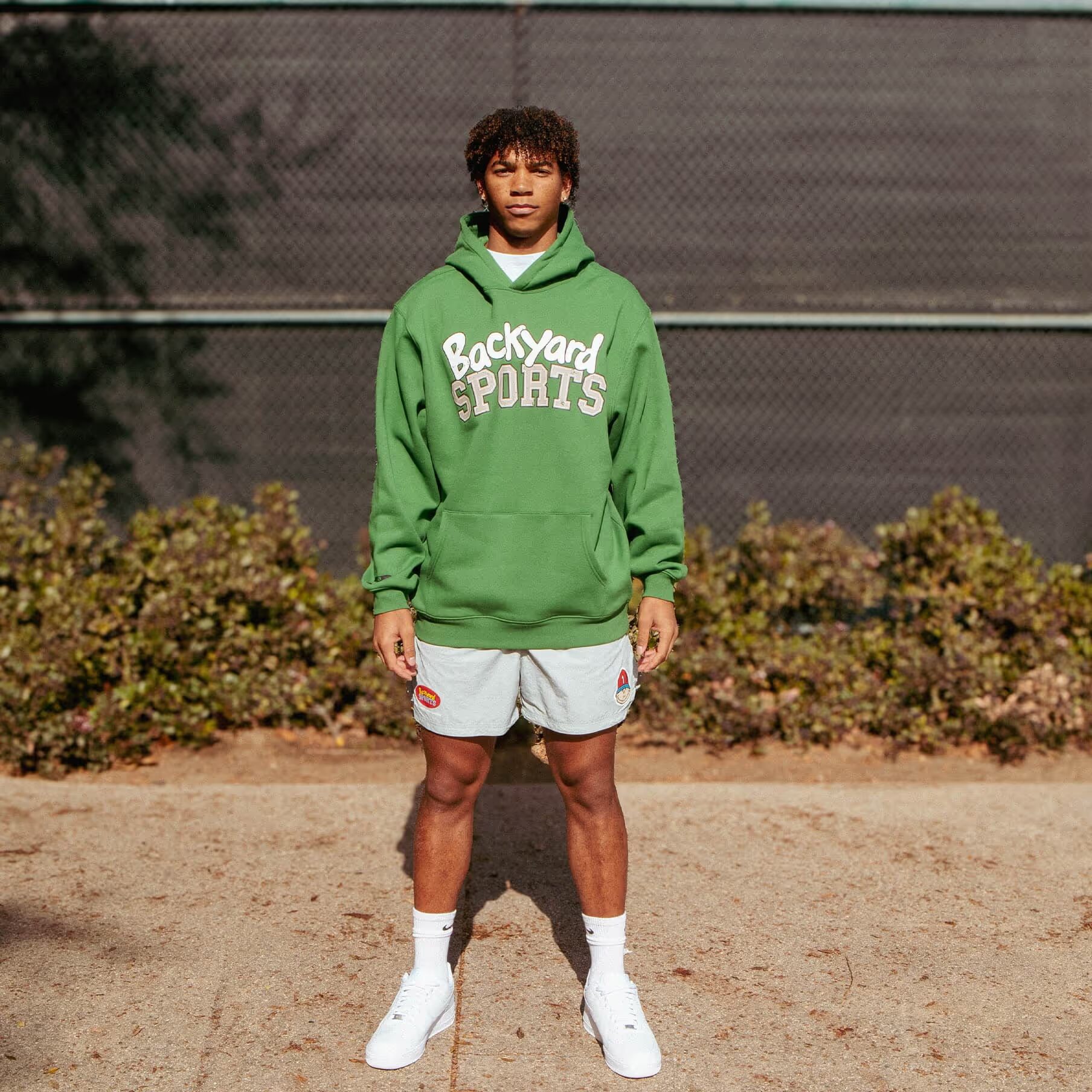Driveway Paradise athlete in backyard sport gear